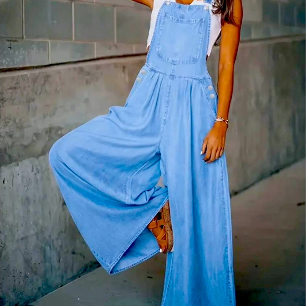 Vintage wash women’s overalls with wide bottoms . OSFA (one size fits all)